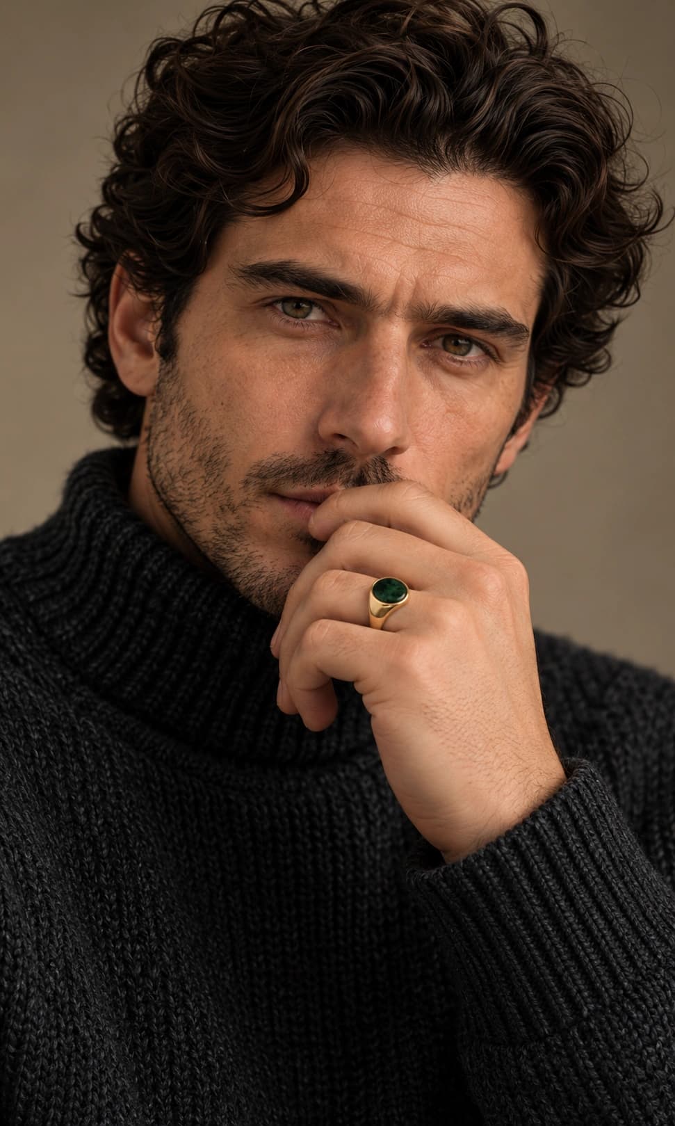 Model wearing the green gemstone ring