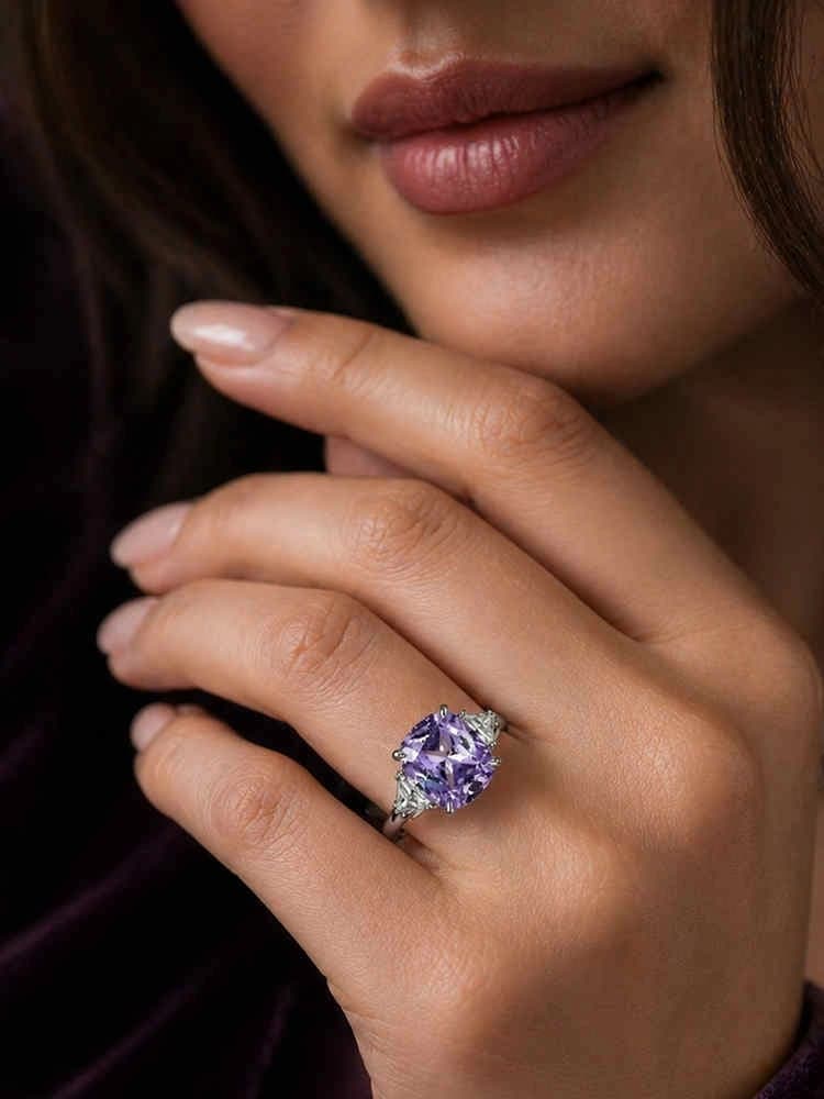 Model wearing a lavender gemstone ring